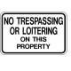 No Trespassing or Loitering on This Property Sign